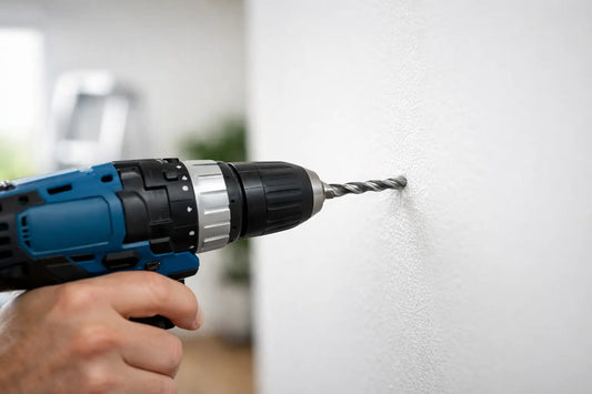 Gat boren in muur zonder schade